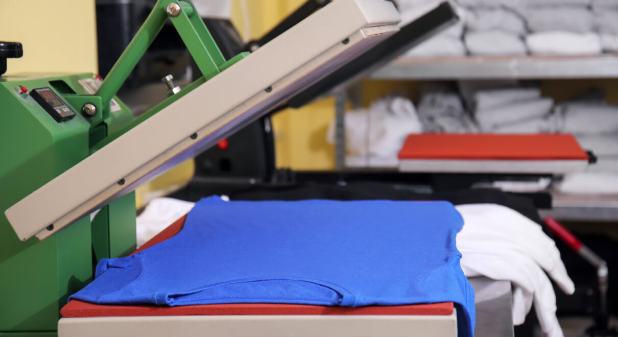 modern-printing-machine-with-t-shirt-workspace